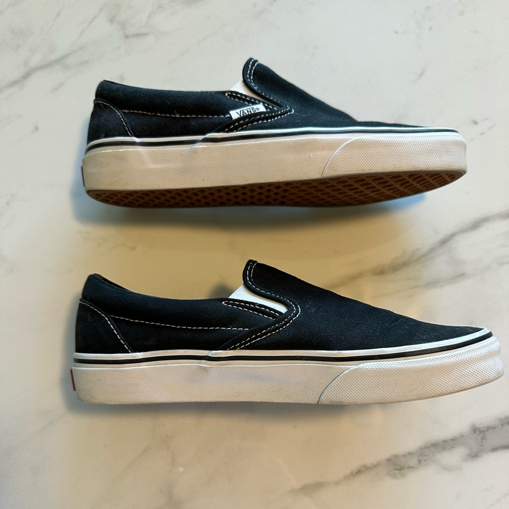 Vans black slip ones. M6, W7.5. Great condition.